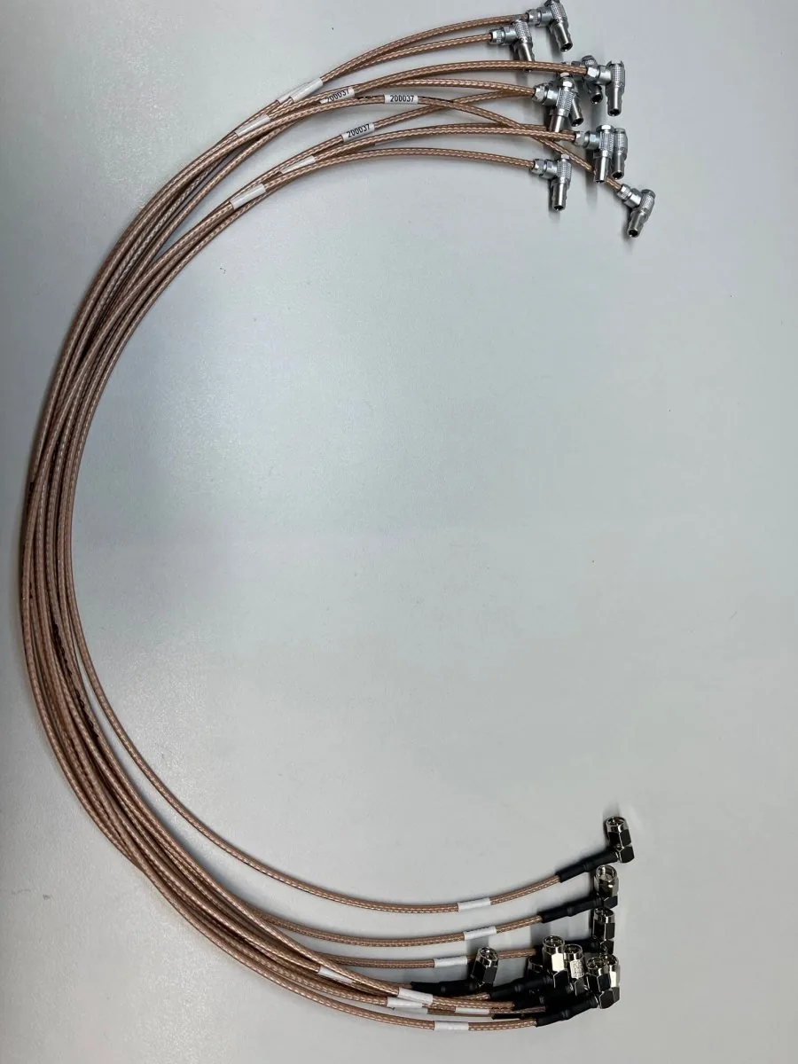 Coaxial cable assembly with multiple connectors