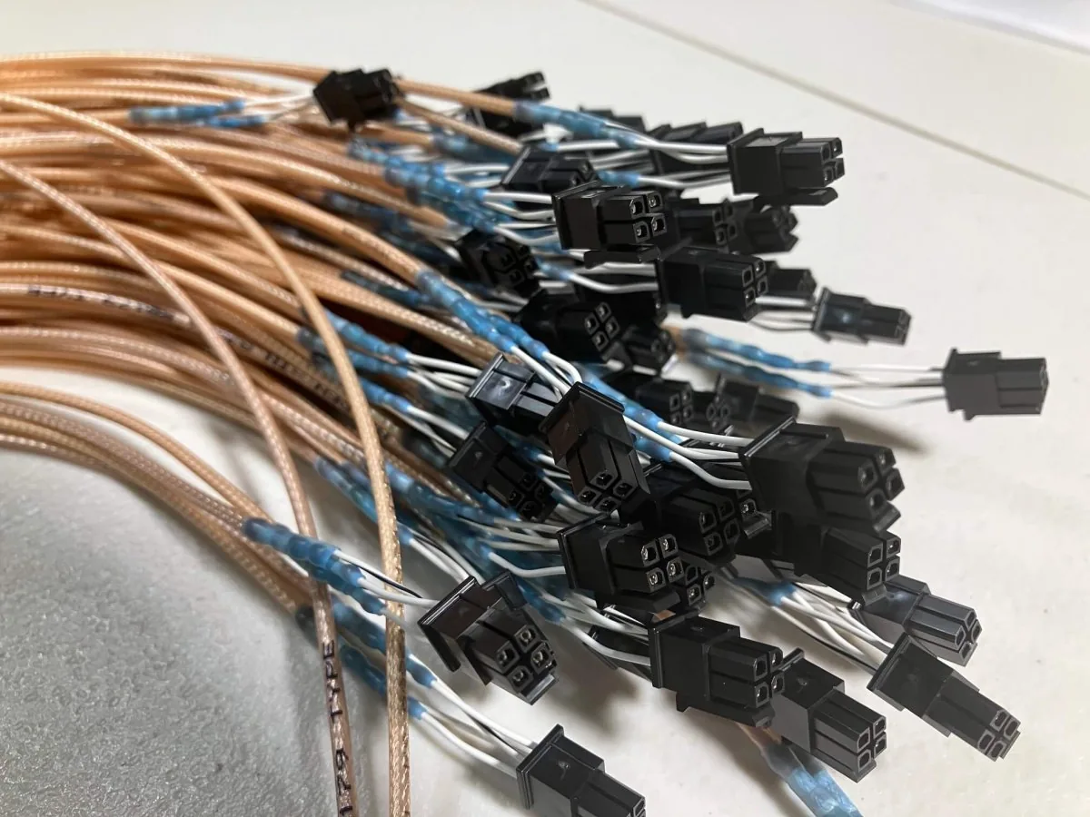 Batch of terminated wire contact assemblies